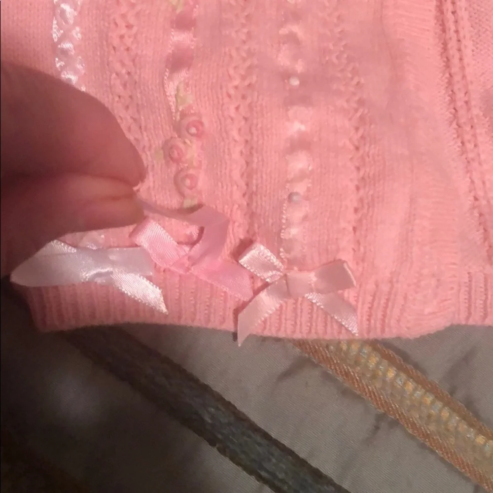 Pink button down sweater from Hartstrings